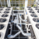 Outdoor HVAC condenser units that rely on definite purpose contactors for compressor and fan control
